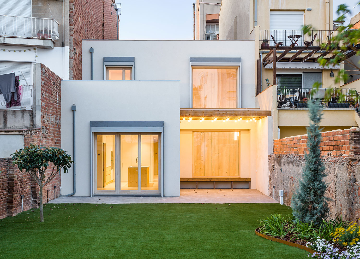 Vista Estudi Arquitectura - Casa de fusta a la ciutat